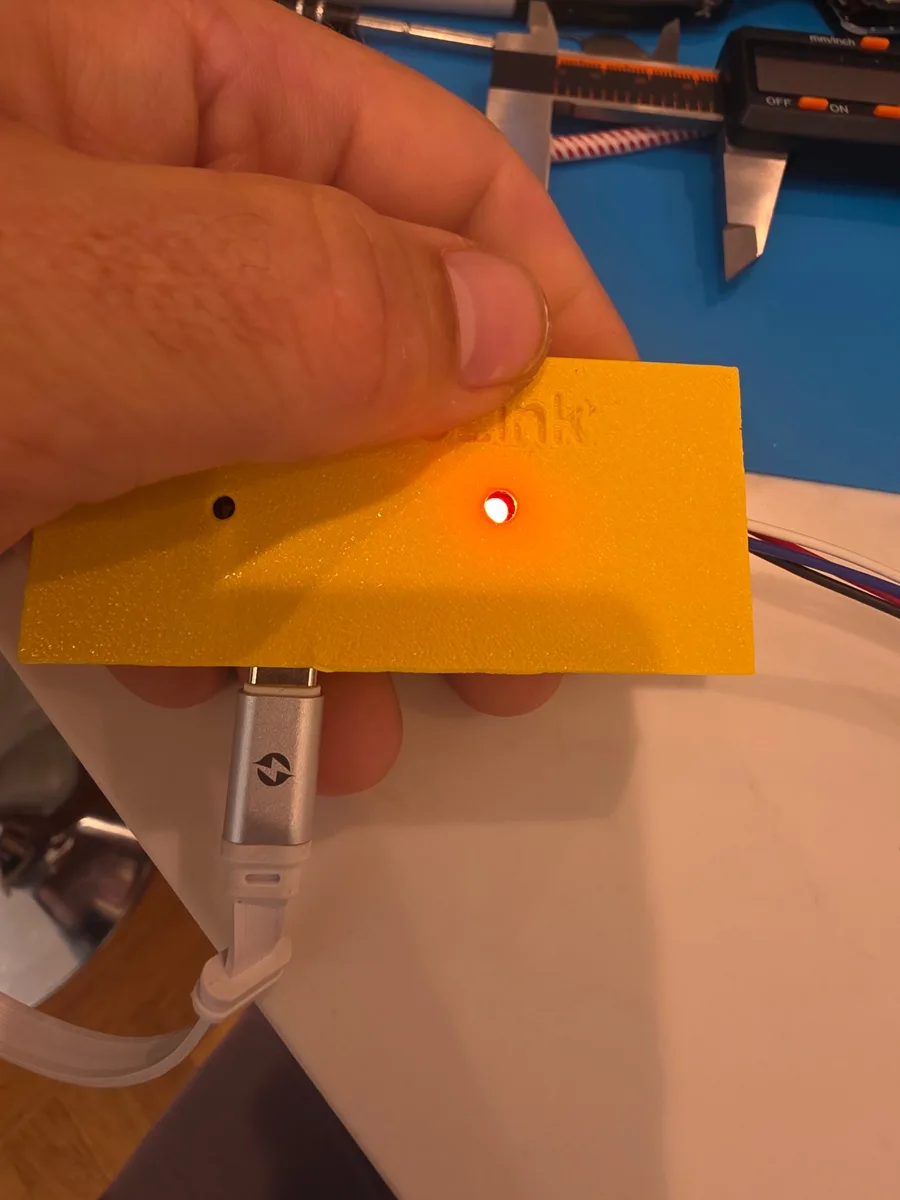 Prototype powered over a USB-C cable with its status LED lit
